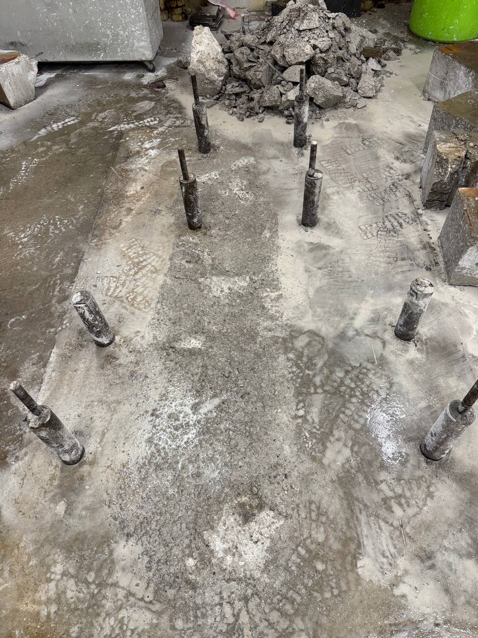 steel pins preserved after concrete foundation removal.jpeg